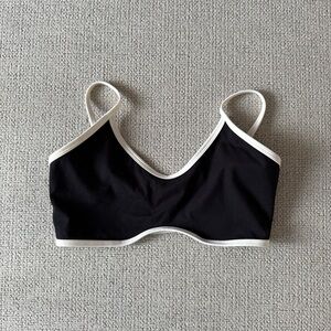 Amazon Aoxjox Black sports bra with White Trim